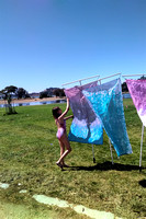 K with her flags at Rationalist Summer Solstice