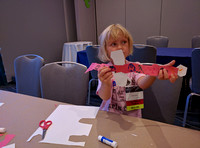 F has gotten quite good with scissor and glue, she's making a big train out of pieces of paper  @Convolution2016