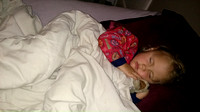 F sleeping with Awoosh (wolf stuffy).