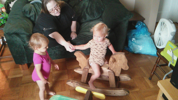 AJ helping with the rocking horse.
