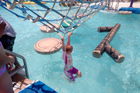 F swinging at a water park