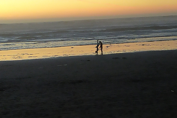 Playing on the beach at the last sunset of 2020