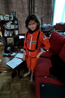 K doesn't fit into her astronaut outfit as well anymore