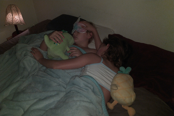 Sleepy girls with stuffies