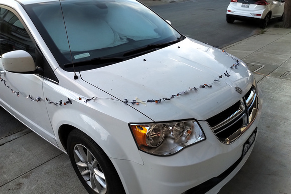 The girls decked out the car with halloween garlands
