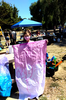 K making flags at Rationalist Summer Solstice