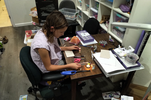 K working with her sealing wax kit