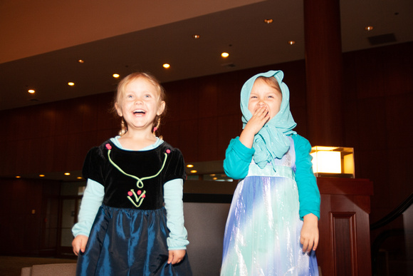 Laughing girls in their Anna and Elsa costumes #BayCon2015