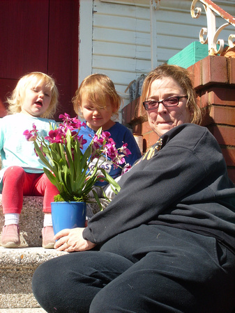 Girls with Aunty M and flowers