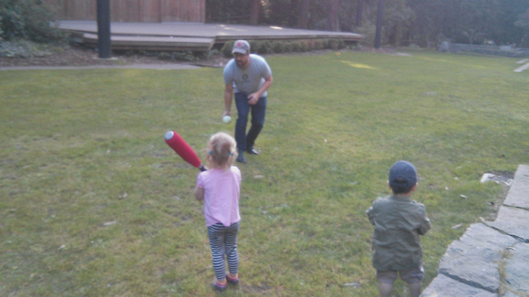 F learning baseball with strangers in Stern Grove.