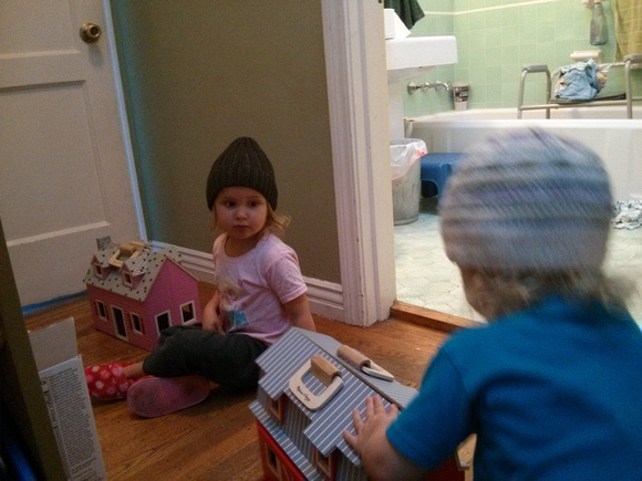 Playing with Ga's present, with hats!