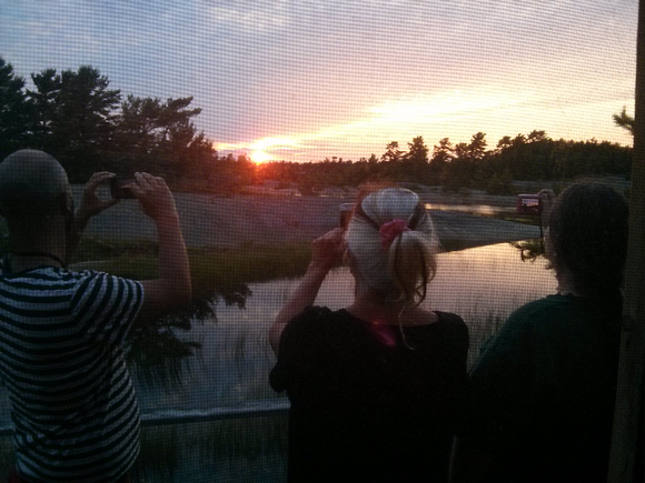 Taking a picture of people taking picture of the sunset, because I love meta.  #MomTrip2015