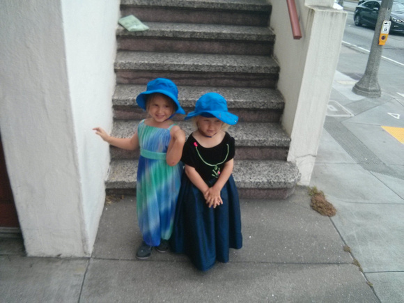 Dressed up!  (K in the Elsa costume, F in the Anna costume, plus hats).