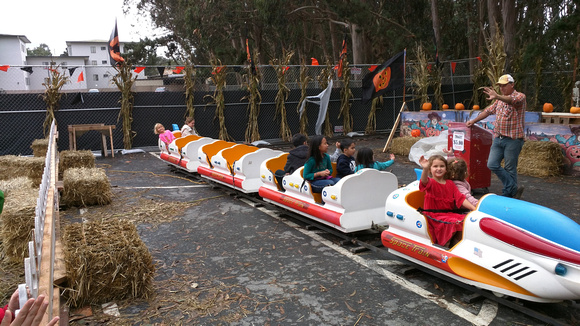 Riding the train at the pumpkin patch.