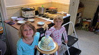 K and F with the princess cake that K and I made.  She helped a lot.