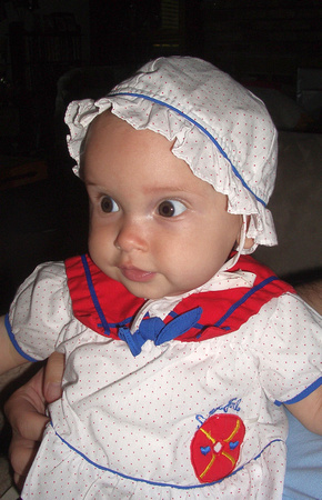 K dressed up for cousin M's high school graduation.  (Baby sailor suit!  :D  Now she just needs to start blowing stuff up "In the name of the moon!")