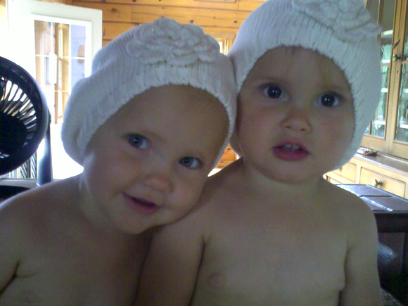 Cute babies in hats.