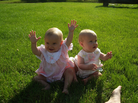 Babies in the grass at Ga's house.