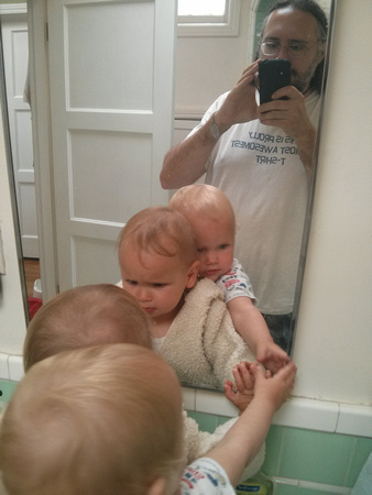 Triple selfie.  Babies love the sink.