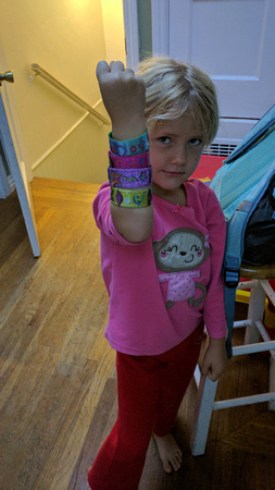 F showing off her bracelets.