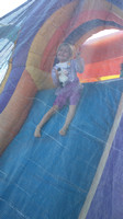 F going down a bouncy slide.