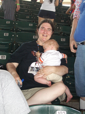 RA with baby at Wrigley Field.