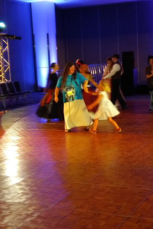 F practicing dancing at Worldcon 76 in San Jose 4/6