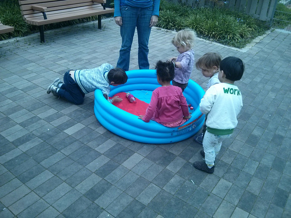 Playing in a dry pool  at the Big San Francisco Play Date at the library.