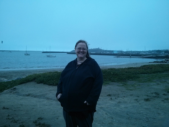 AJ at the seaside with the secret military complex in the background.