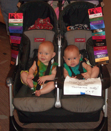 The stroller is a bit big for them yet.  :)  Usually they're a lot more bundled up, too, it was warm at BayCon.