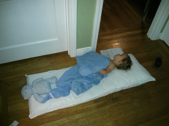 K made her own bed in the hallway.
