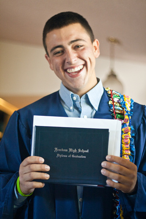 Cousin M in his high school graduation garb.