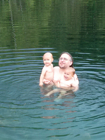 Swimming in the pond with Daddy Robin.