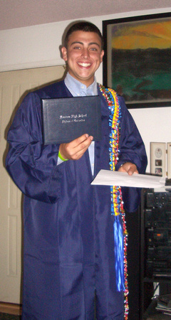 Cousin M in his high school graduation garb.