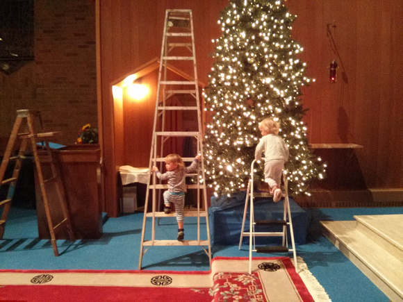 Babies want to help with xmas at church.