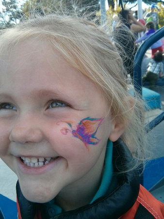 F with butterfly face paint