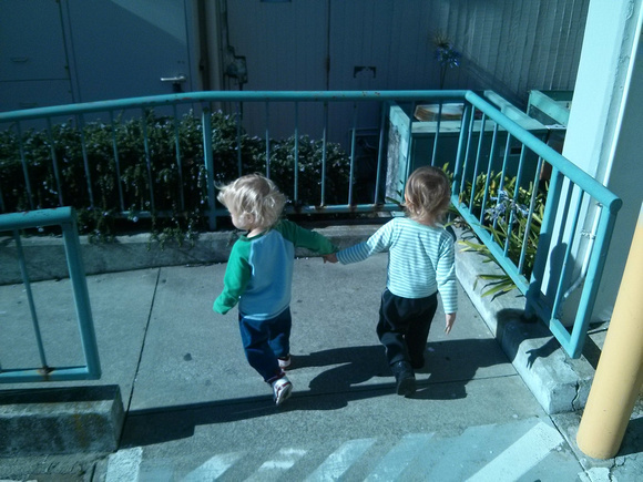 Walking to the bouncy house, F told K to hold hands.  :3