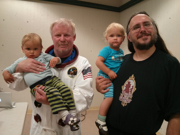 Babies with an astronaut uniform! at Hugh's wake.