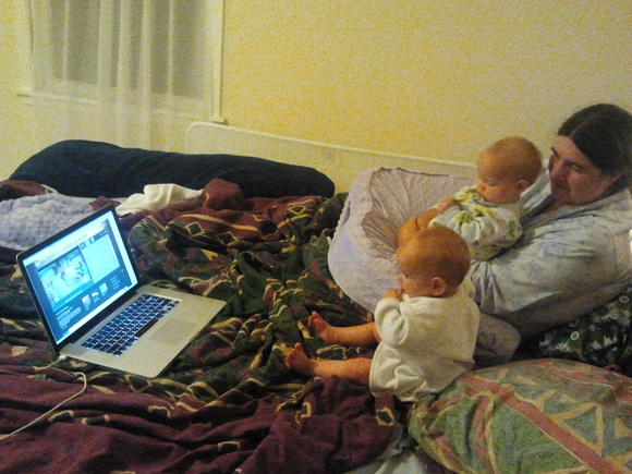 RA and babies (and RLP holding the camera) watching the landing of the Curiosity [sic] Mars mission on NASA TV.