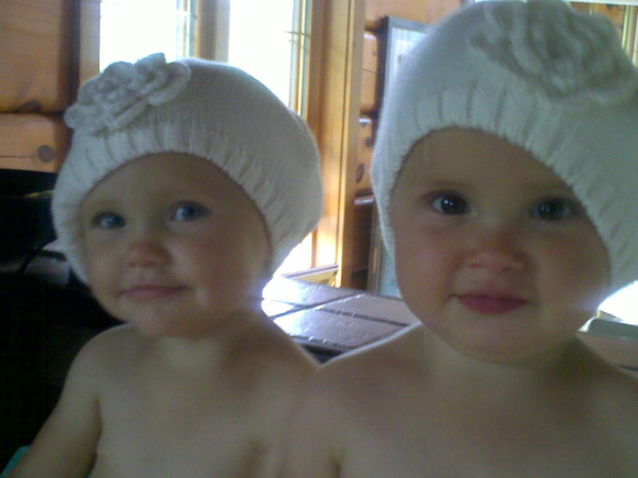 Cute babies in hats.