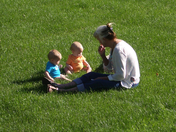Ga in the grass with babies.
