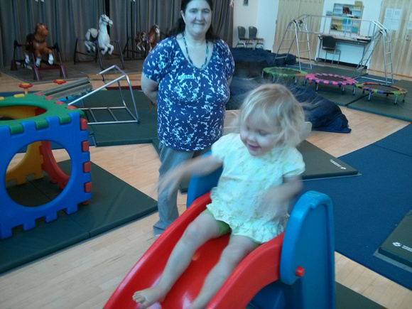 Playing on the slide at play class.