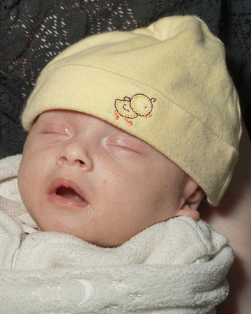 K asleep in AJ's lap, December 2011