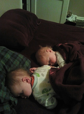 F and K asleep on RLP's bed.
