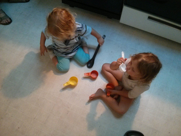 Playing in the kitchen.