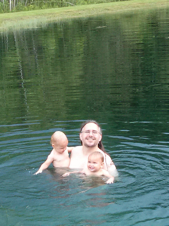Swimming in the pond with Daddy Robin.